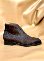 Brown horsehide chukka boots for men, three quarter view