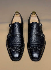 Close-up of full quill ostrich leather follicles on a dark brown oxford