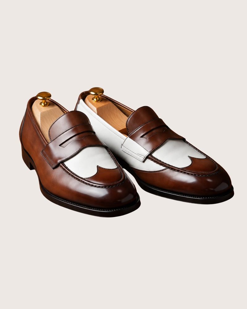 Brown and white penny loafers