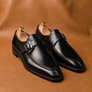black single monk strap shoes with split toe, handmade leather