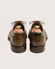Brown patina wingtip oxford