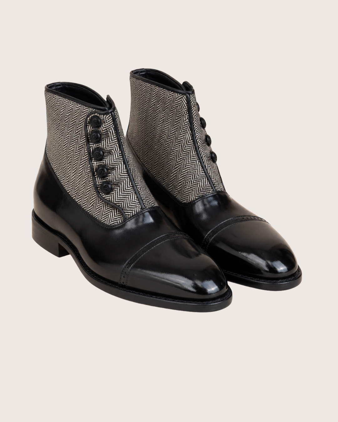 Black norwegian stitch button boots