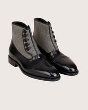 Black norwegian stitch button boots