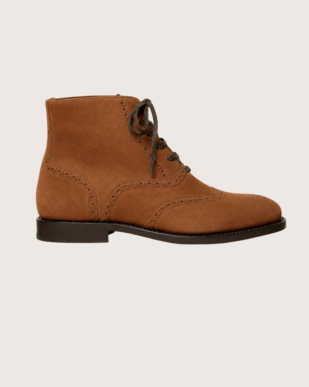 Saddle brown wingtip suede boots