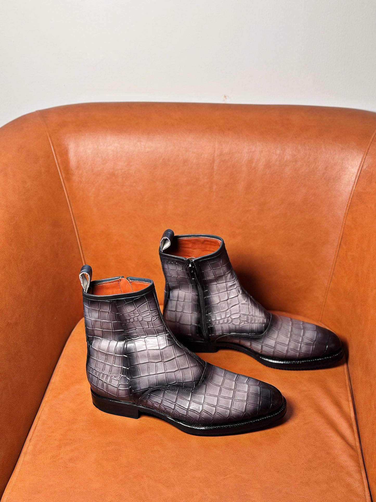 Gray and black patina croc boots