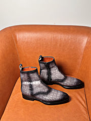 Gray and black patina boots