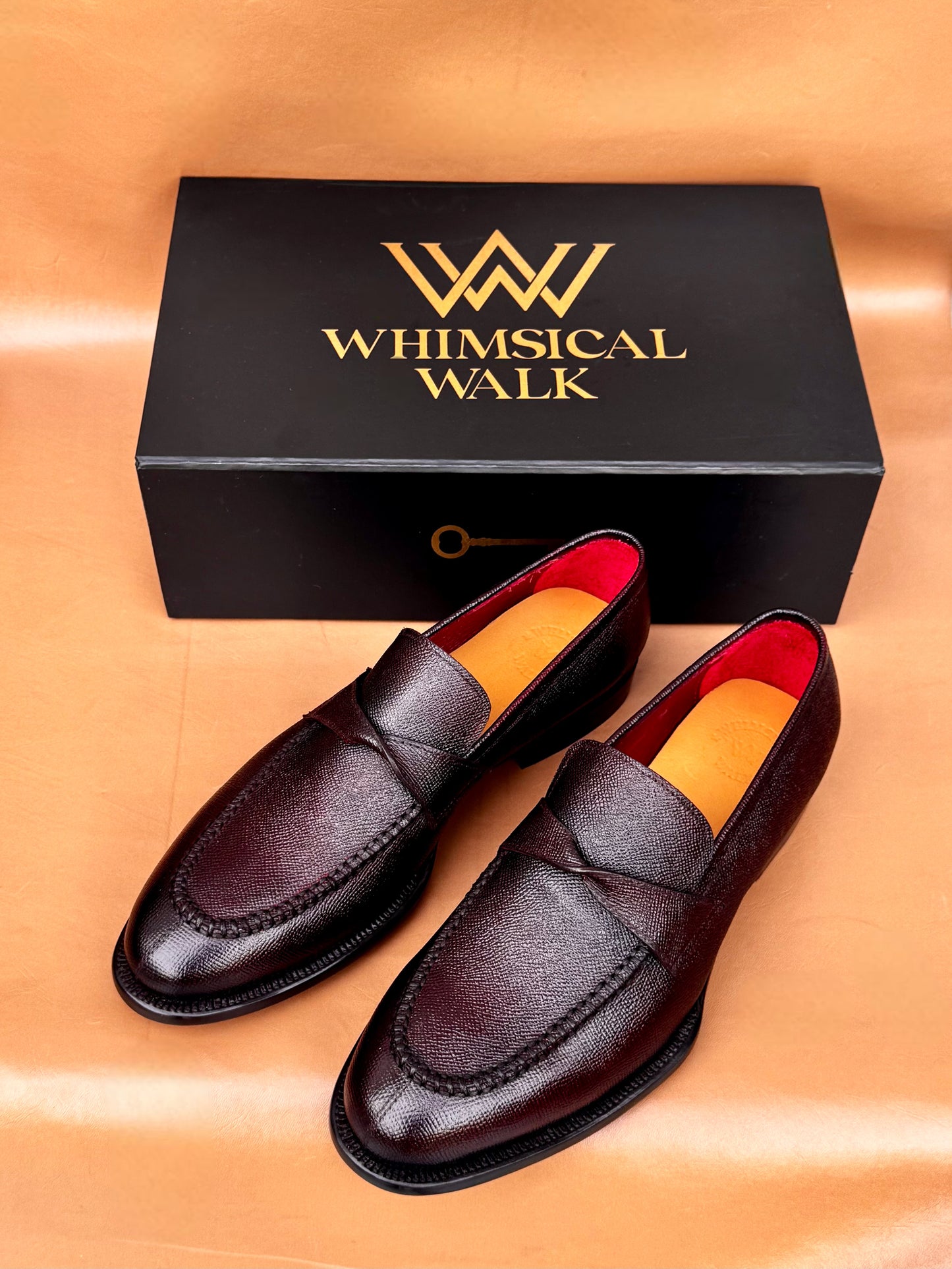 Brown twist strap loafers