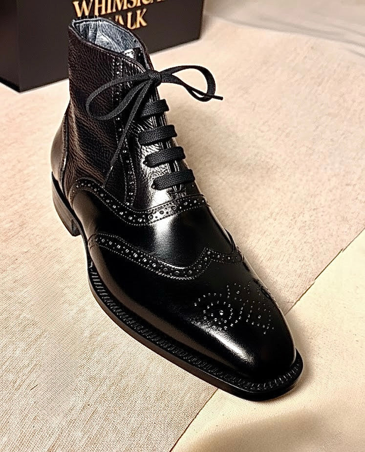 Black wingtip boots