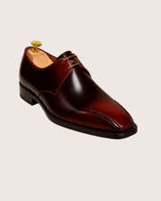 Stitched toe derby