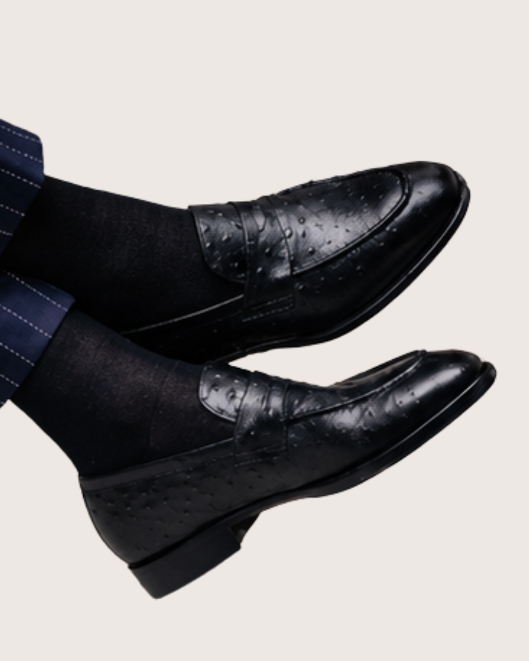 Black ostrich skin penny loafers