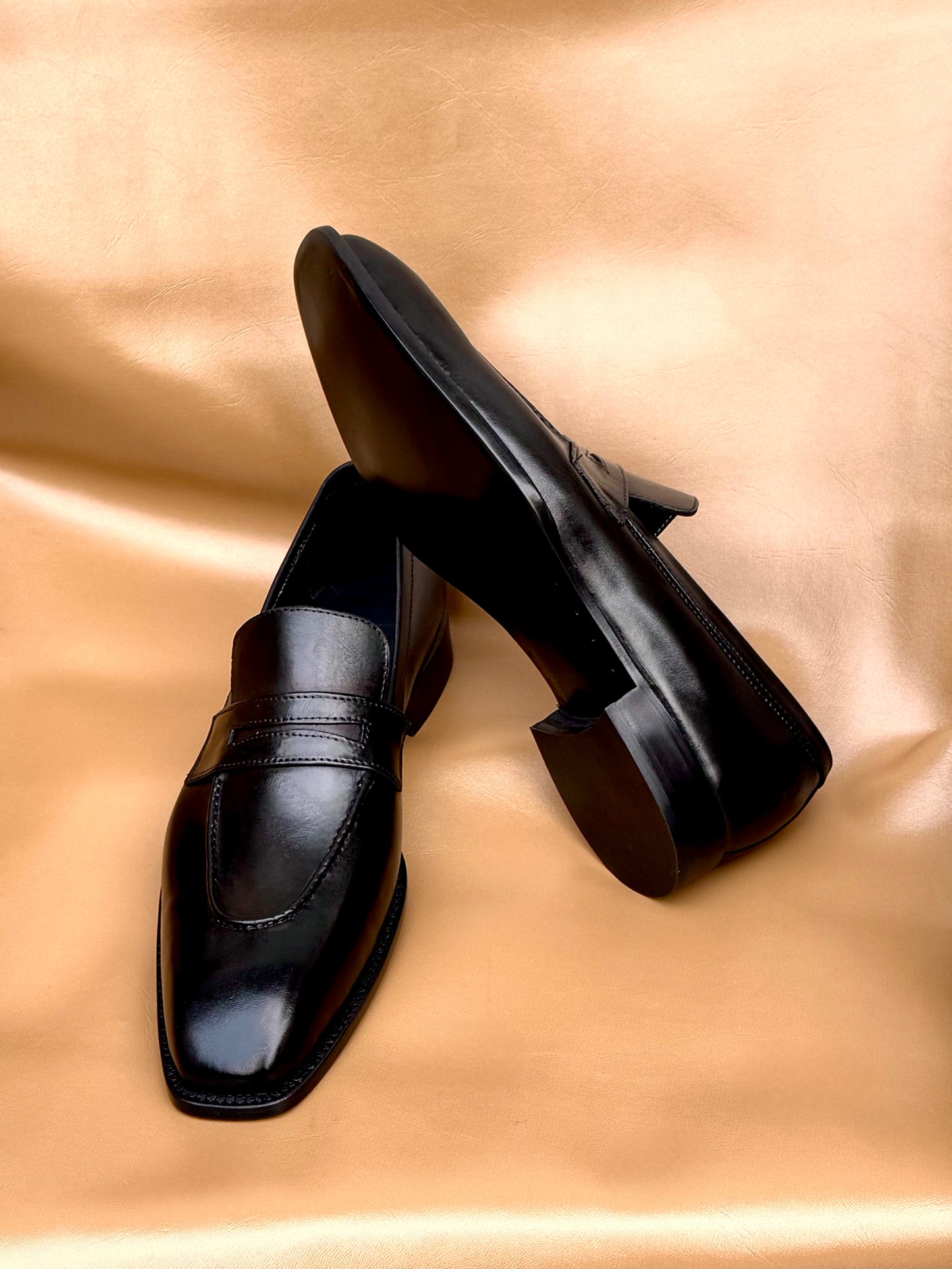Black penny loafers
