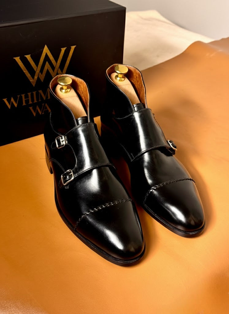 Black monks-strap boots