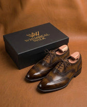 Brown patina wingtip oxford