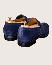 Blue suede penny loafers