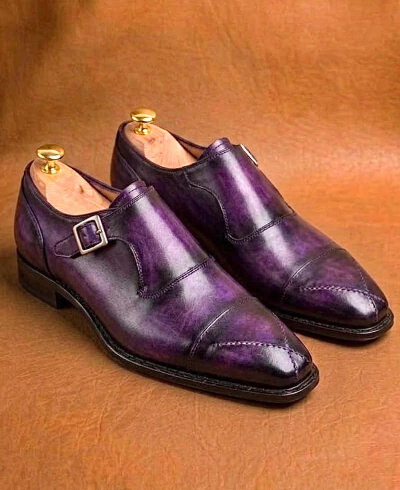 Cross stitched toe detail on a purple patina shoe