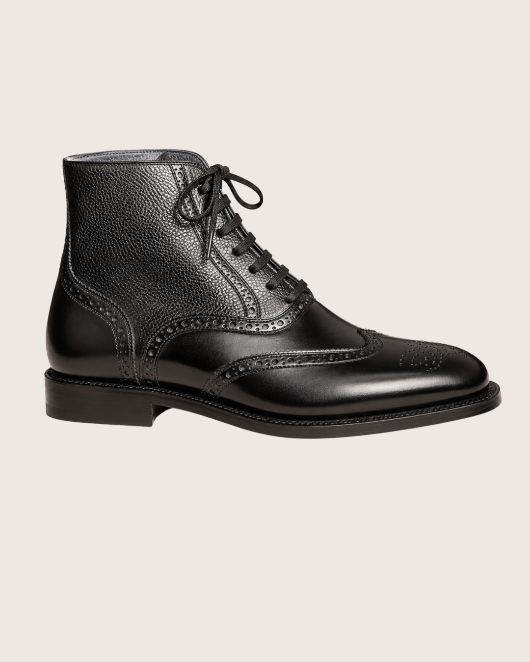Black wingtip boots