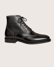 Black wingtip boots