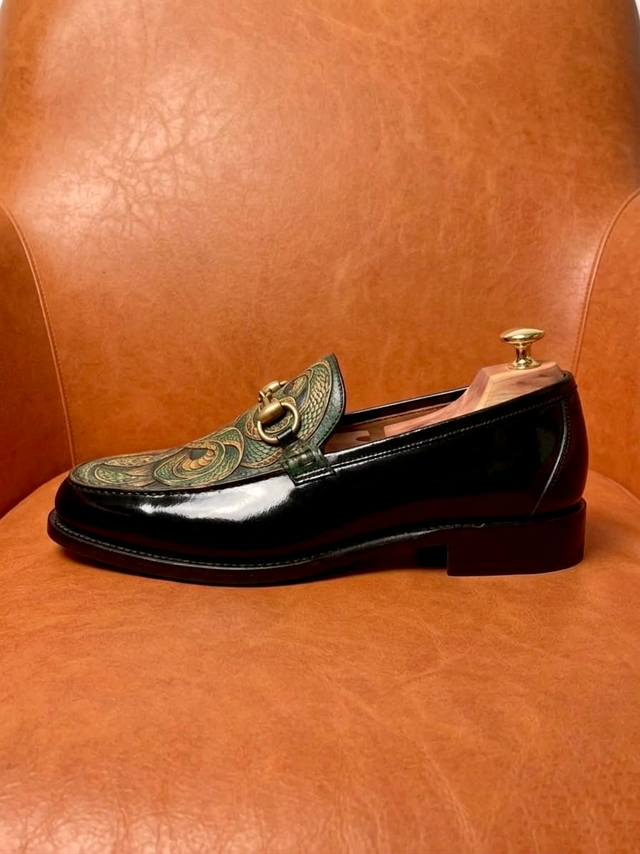 The ouroboros penny loafers