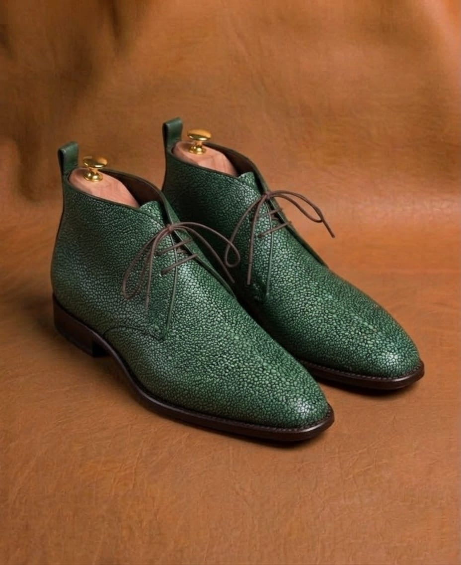 Green stingray derby boots for men, three-quarter view showing polished pearl stingray