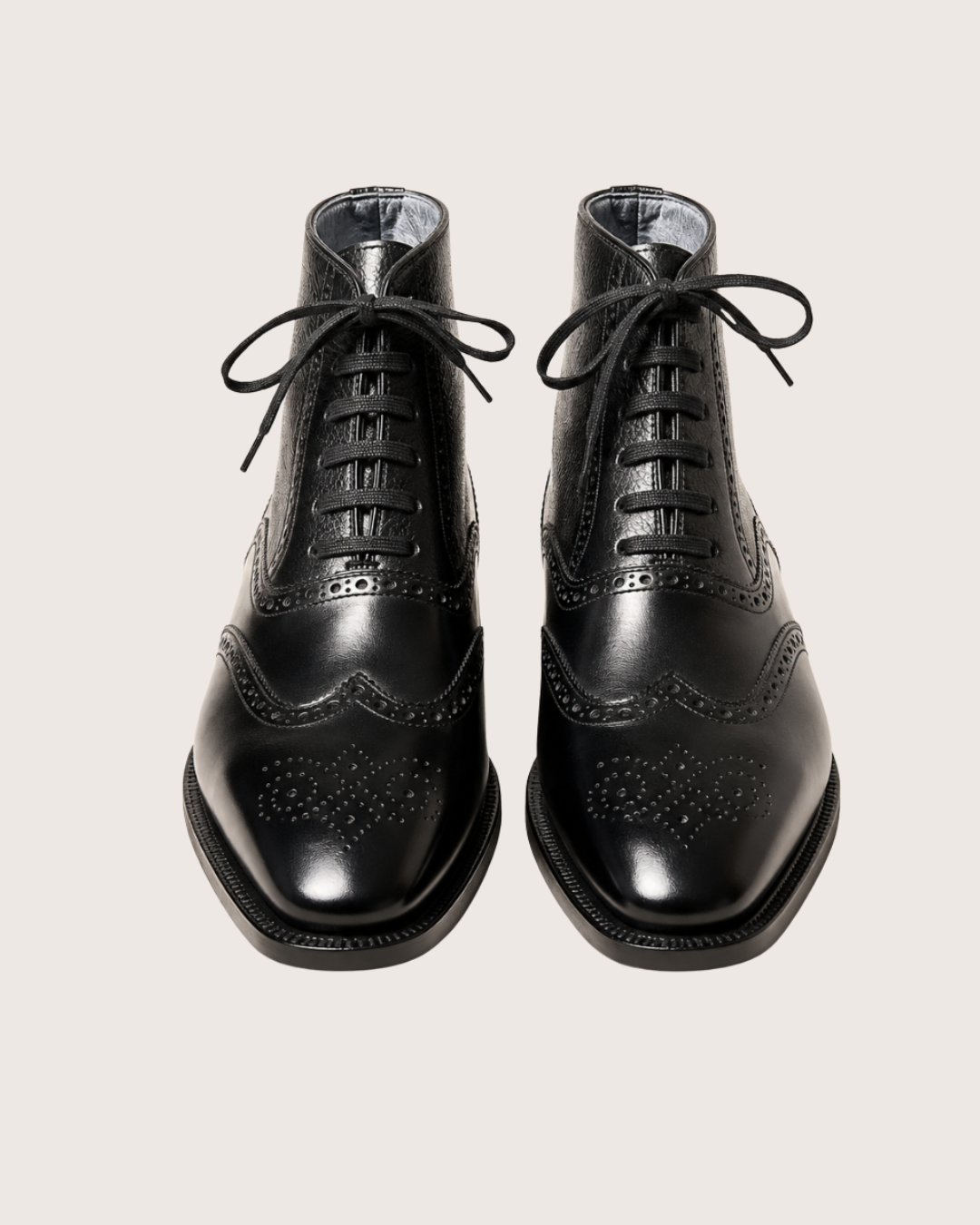 Black wingtip boots