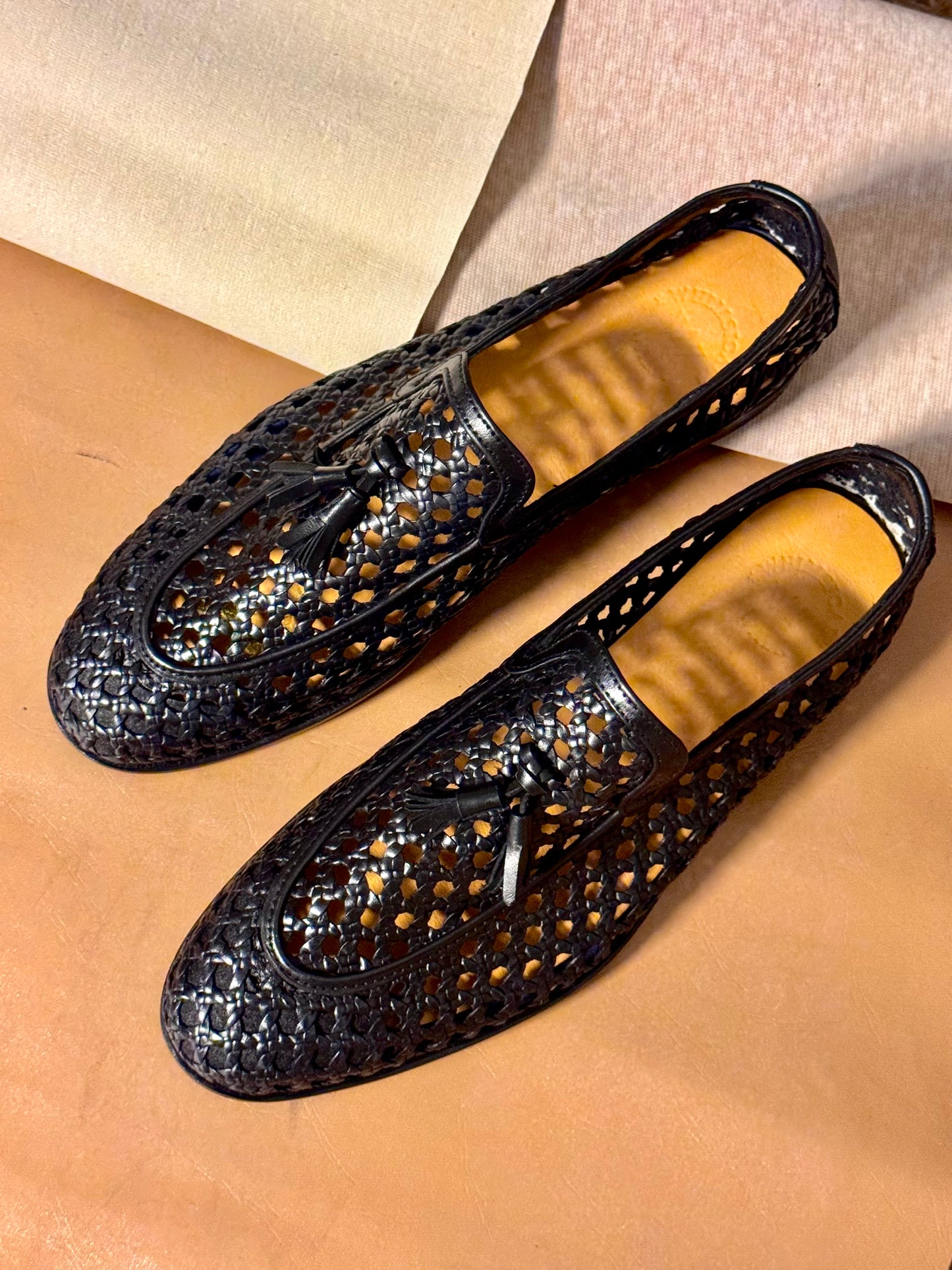 Black Intrecciato tassel loafers