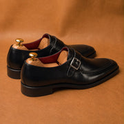 black single monk strap shoes with split toe, handmade leather