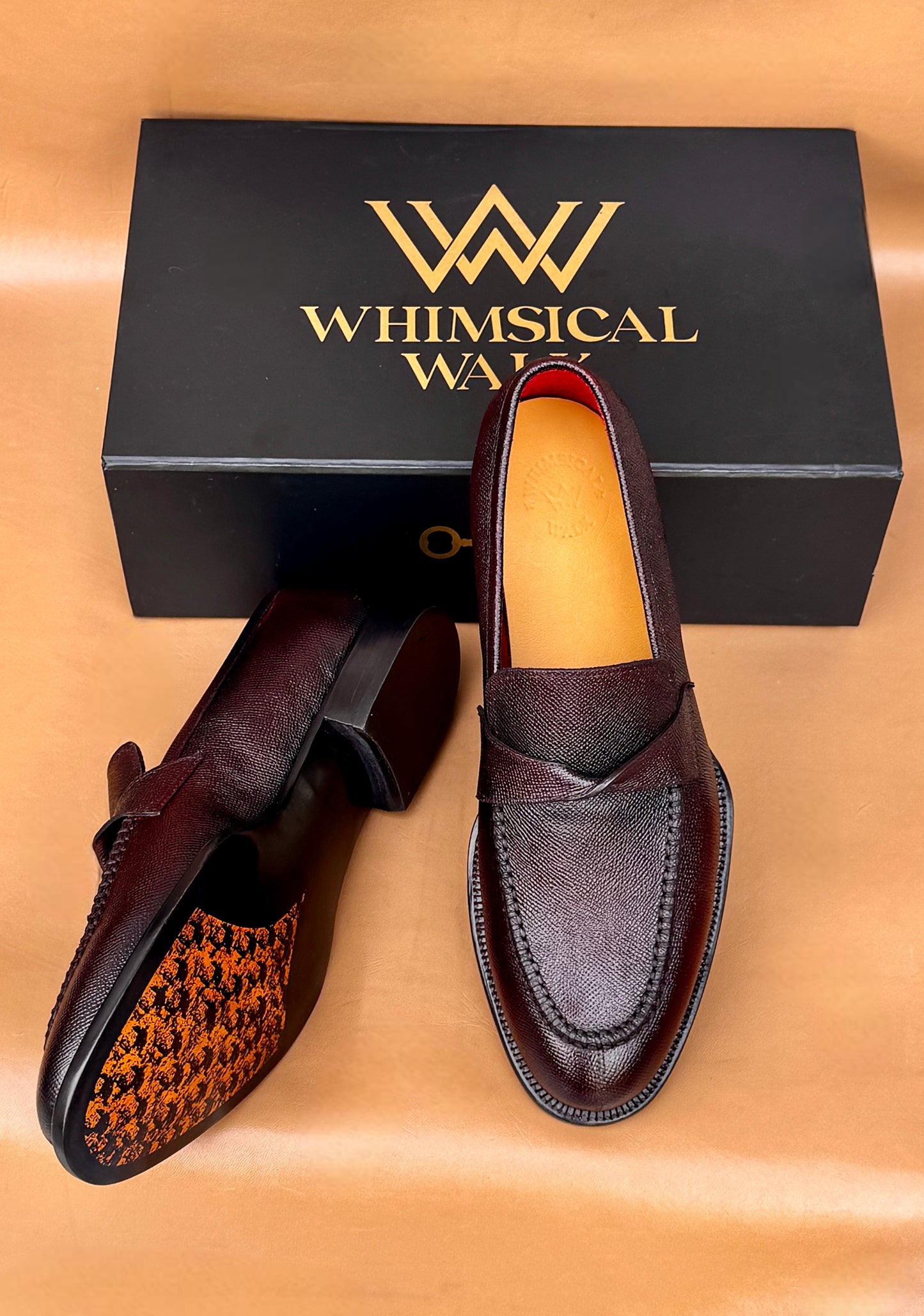 Brown twist strap loafers