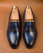 Blue patina penny loafers