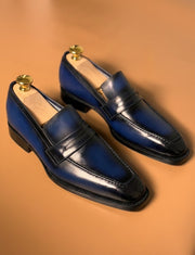 Blue patina penny loafers