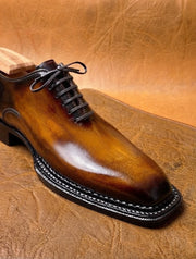 Tan burnished toe triple welt oxford