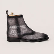 Gray and black patina boots