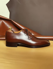 Brown medallion derby