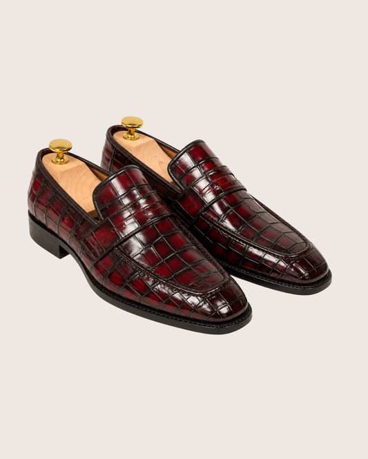 Red crocodile penny loafers