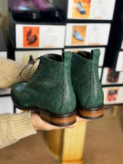 Open lacing on a green stingray derby boot, five eyelets