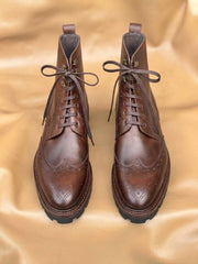 Brown wingtip boots